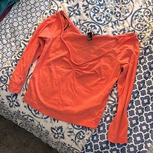 Coral crop top synched in at the bust. Super cute! Formfitting.